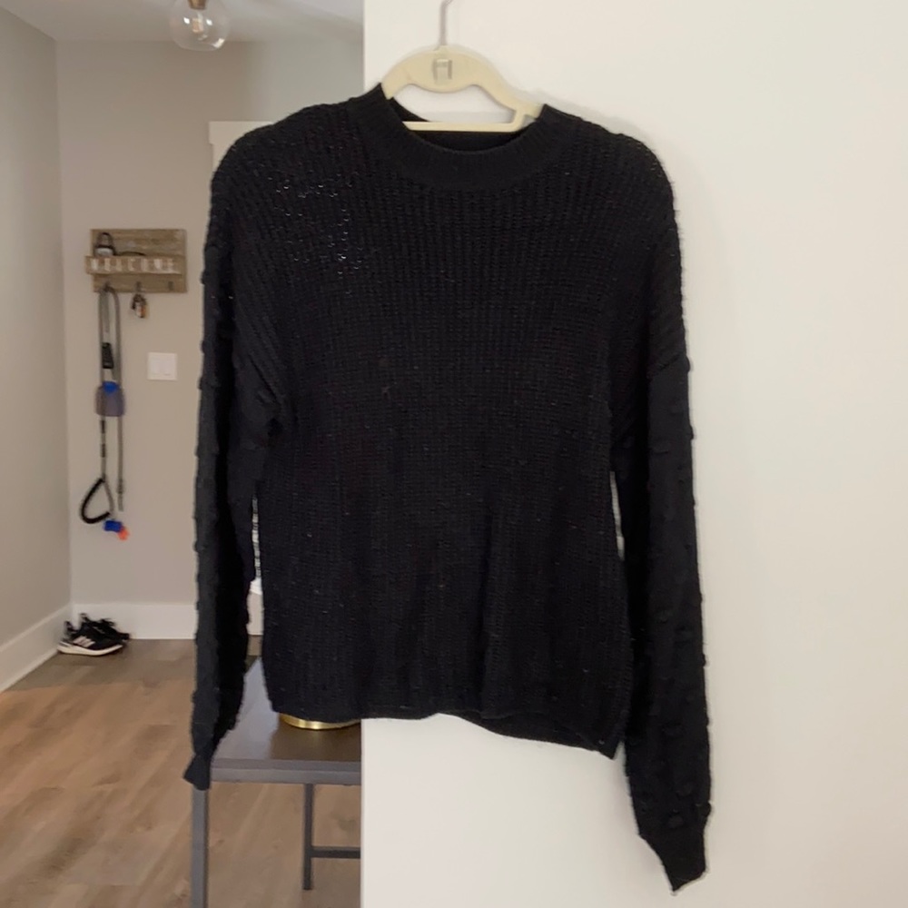 Black sweater with bubble sleeve detail